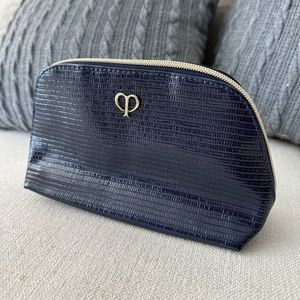 Cle De Peau faux leather cosmetic pouch